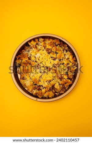 cod fish with corn bread, spinach and boiled beans on dish