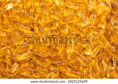 Cod Liver Oil Capsules Close Up. Supplements Top Down View 