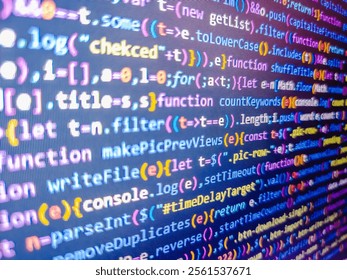 Code background. Programming code screen of software developer. Elearning concept with internet related words. Financial data processing against stock market concept text on paper. Blue color.