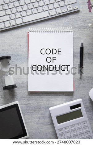 Code Of Conduct on notepad. Business concept
