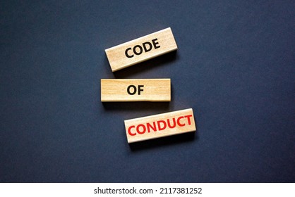 Code of conduct symbol. Concept words Code of conduct on wooden blocks on a beautiful black table black background. Business and code of conduct concept. Copy space. - Shutterstock ID 2117381252