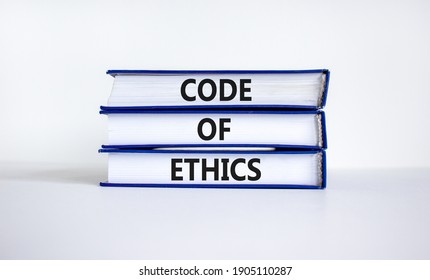 Code Of Ethics Symbol. Books With Words 'code Of Ethics' On Beautiful White Table, White Background. Business And Code Of Ethics Concept. Copy Space.