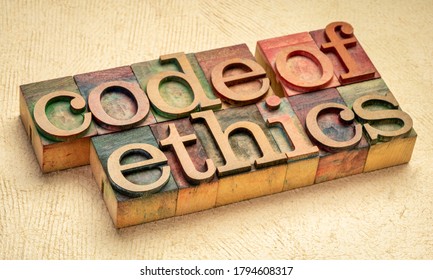 Code Of Ethics Text In Vintage Letterpress Wood Type Printing Blocks Stained By Color Inks, Values, Ethical Principles, And Standards Concept