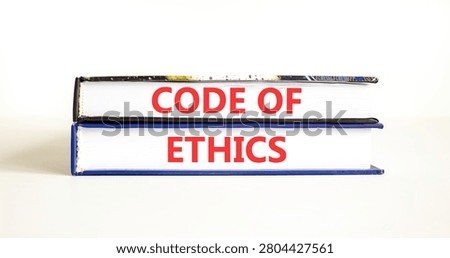 Code of ethics words symbol. Concept words Code of ethics on beautiful books. Beautiful white background. Business Code of ethics concept. Copy space.