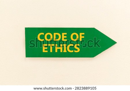 Code of ethics words symbol. Concept words Code of ethics on beautiful green information sign. Beautiful white wall background. Business Code of ethics concept. Copy space.