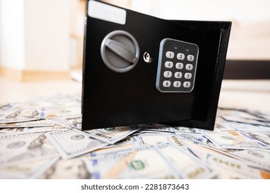 Code lock safe door against dollar money. - Shutterstock ID 2281873643