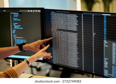Code program logic line on monitor with finger point of IT staffs to point to error line , Technology logic concept. - Powered by Shutterstock - Get 15% off with code: PIKWIZARD15