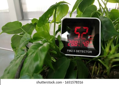 Code Red, Harmful PM 2.5 Invisible Harmful Dust Founded By Large Amount In An Indoor Environment. Bad Environment Poor Air Quality Even With Plant. Air Too Polluted Environment Beyond Natural Order.