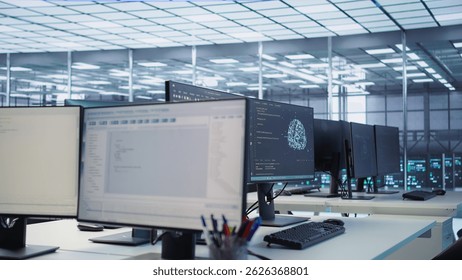 Code running on computer screens in empty data center workspace, used for troubleshooting rackmounts. Close up of script working on desktop PC monitors upgrading mainframes systems in server room