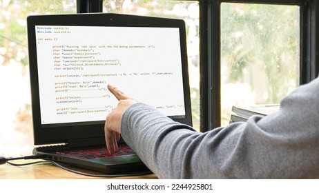 Coders advance the digital world; programmers sit at home doing analysis and coding. The screen of the computer shows statistics.