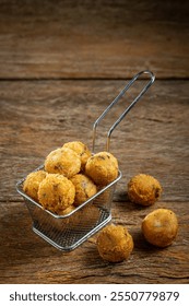 Codfish dumplings. fried dumpling, cod dumpling, fish meat, bacalao bunuelos.