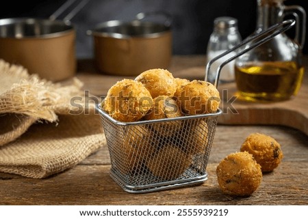 Codfish dumplings. fried dumpling, cod dumpling, fish meat, bacalao bunuelos.