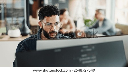 Coding, computer and web development with man in creative workplace for design or programming. Cyber security, language and system maintenance with employee person in office as website developer