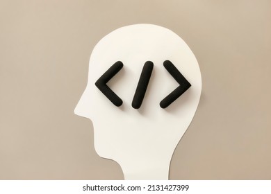 Coding language development icon inside a humans head. Software development concept of innovation or digitization. Programming code browser symbol inside the mind. - Powered by Shutterstock - Get 15% off with code: PIKWIZARD15