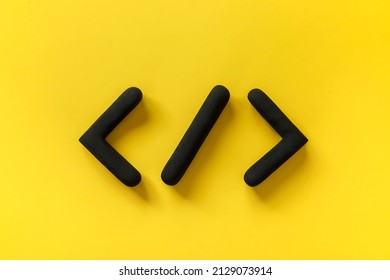Coding language development icon on yellow background. Software development concept. Programming code browser symbol, 3d sign website coding.