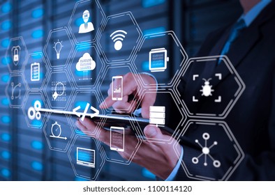 Coding software developer work with augmented reality dashboard computer icons of scrum agile development and code fork and versioning with responsive cybersecurity.businessman using tablet computer.
