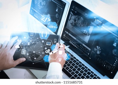 Coding software developer work with augmented reality dashboard computer icons of scrum agile development and code fork and versioning with responsive cybersecurity.Medical network technology concept - Powered by Shutterstock