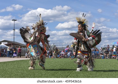 Coeur D'Alene, Idaho USA - 07-23-2016. Opposing Native Americans At Powwow Dance. Young Dancers Participate In The Julyamsh Powwow On July 23, 2016 Coeur D'Alene, Idaho.