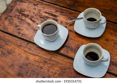 Coffe In White Cup On Wooden Table Outdoor