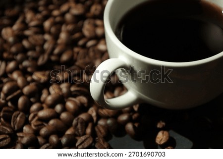 Coffee background, coffee cup with coffee beans background 