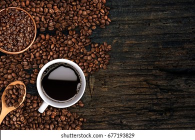 Coffee Cup Beans Placed On Wooden Stock 