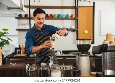 Coffee barista man make espresso shot from coffee maker hot cup. Cappuccino with milk in italian coffee shop cafe. Close up hands of barista use machine make brown latte art for customer cafeteria - Powered by Shutterstock