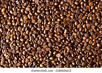 Coffee Beans. Background Of Roasted Fresh Brown Coffee Beans. Perfect For A Cool Wallpaper. Banner For Cafe. Template For Cafe Menu.  Copy Space. Beautiful Closeup Shot Of Fresh Black Coffee Beans