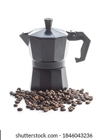 Coffee beans and bialetti coffee maker.  Moka pot isolated on white background.