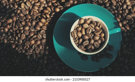 Coffee beans in blue cup