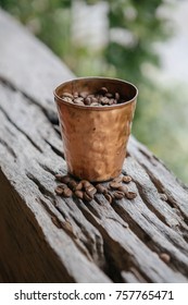 Coffee beans in cup