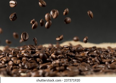 Coffee Beans Falling On The Table