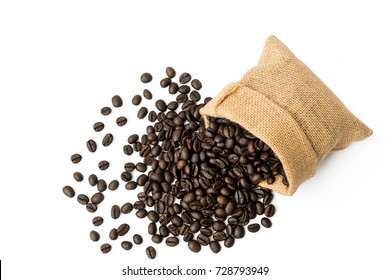 Coffee beans falling out burlap sack isolated in white background, Top view with copy space for your text message or promotional content.