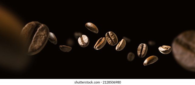 Coffee beans in flight on a dark background - Shutterstock ID 2128506980