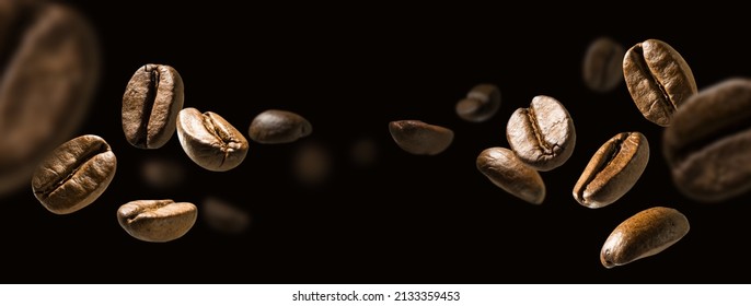 Coffee beans in flight on a dark background - Shutterstock ID 2133359453