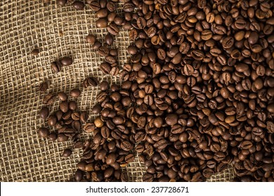 Coffee beans on a burlap. - Powered by Shutterstock