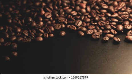 Coffee Beans On Dark Classic Texture Background For Drinking , Taste And Food Concept