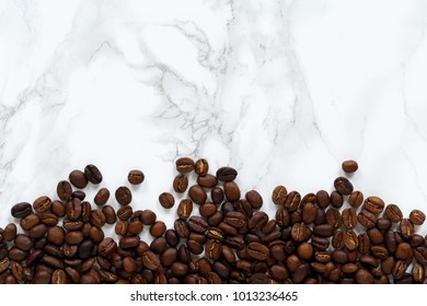 Coffee beans on marble background 