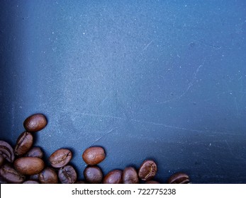Coffee beans on table. Background top view with copyspace for your text