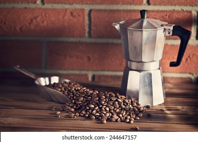 the coffee beans on wooden table