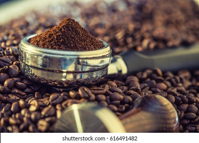 Coffee beans and portafilter.  - Powered by Shutterstock