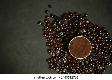 Coffee beans with coffee powder  - Shutterstock ID 1443512768