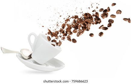 coffee beans and powder spilling out of a cup isolated on white - Powered by Shutterstock