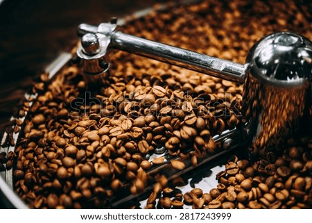 Coffee beans in a roaster.