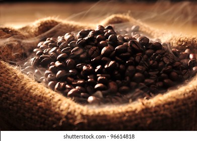 Coffee Beans With Smoke In A Bag.