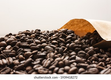 Coffee beans. Coffee beans are spread out on the surface. - Shutterstock ID 1939418272