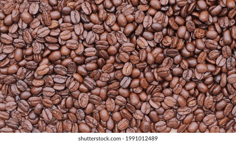 Coffee beans texture background, top view of coffee bean background. Coffee  - Shutterstock ID 1991012489