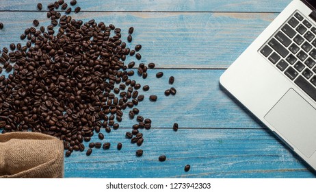 coffee beans and work on table