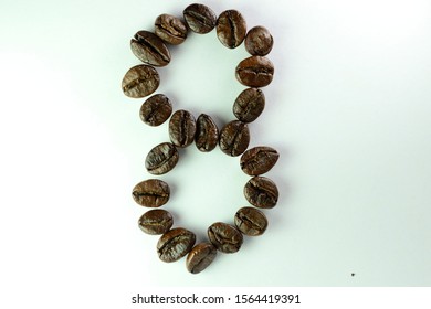 Coffee Been, the number eight is formed with coffee beans in white background - Powered by Shutterstock