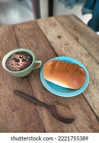 Coffee and bread on the table