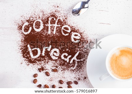 coffee break concept - cup of espresso and coffee break lettering